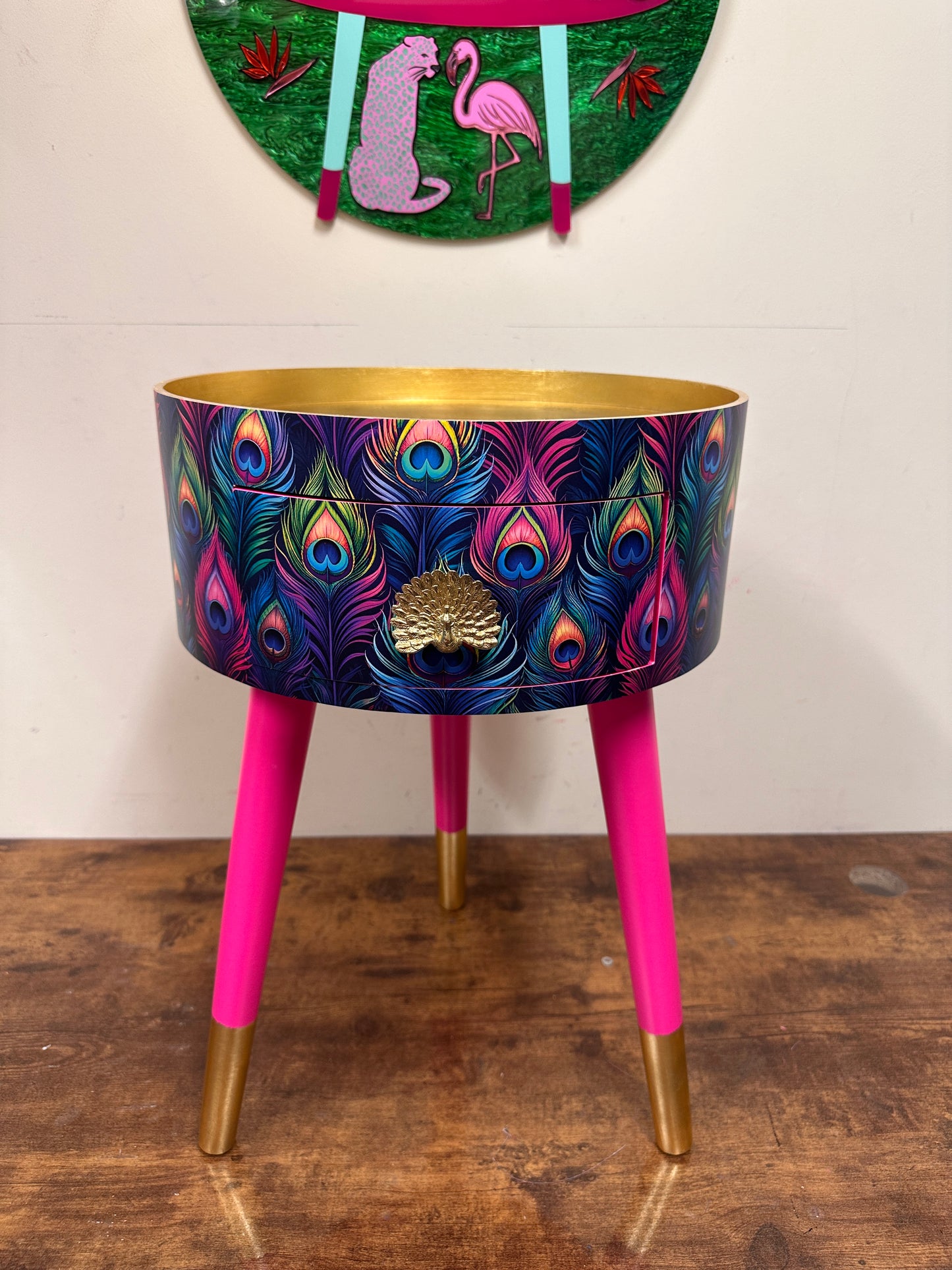 Colourful peacock table with gold leaf