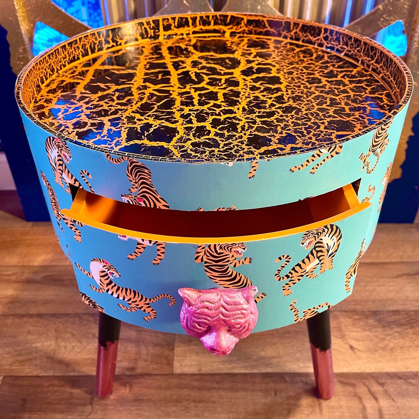 Tiger Table - Turquoise circular tiger table with pink handle . Ideal for nightstand or sidetable . Comes with inbuilt drawer. Customisable