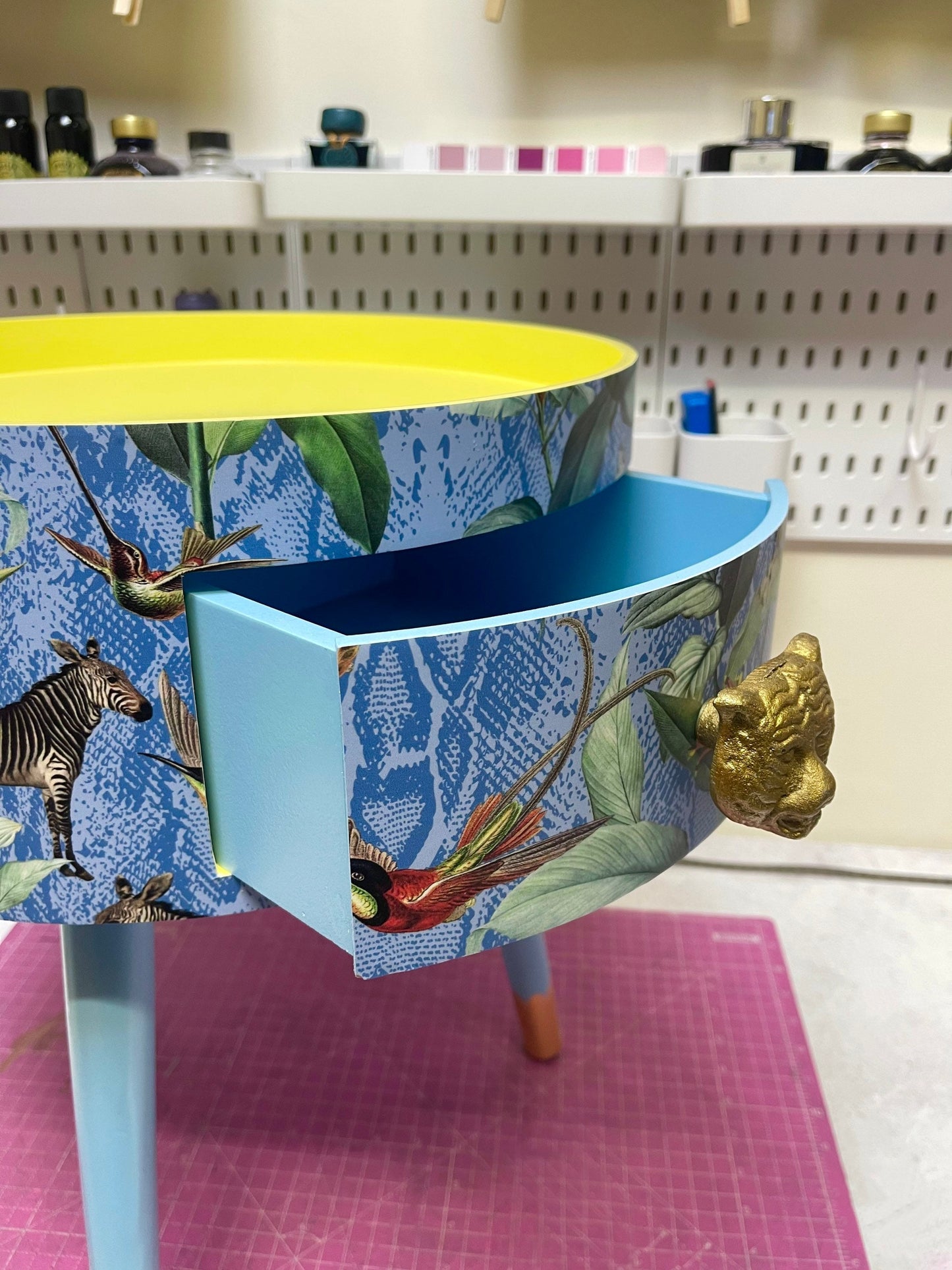 Round primrose yellow and baby blue zebra side table, leaf and tropical design Nightstand with drawer . Quirky fun table