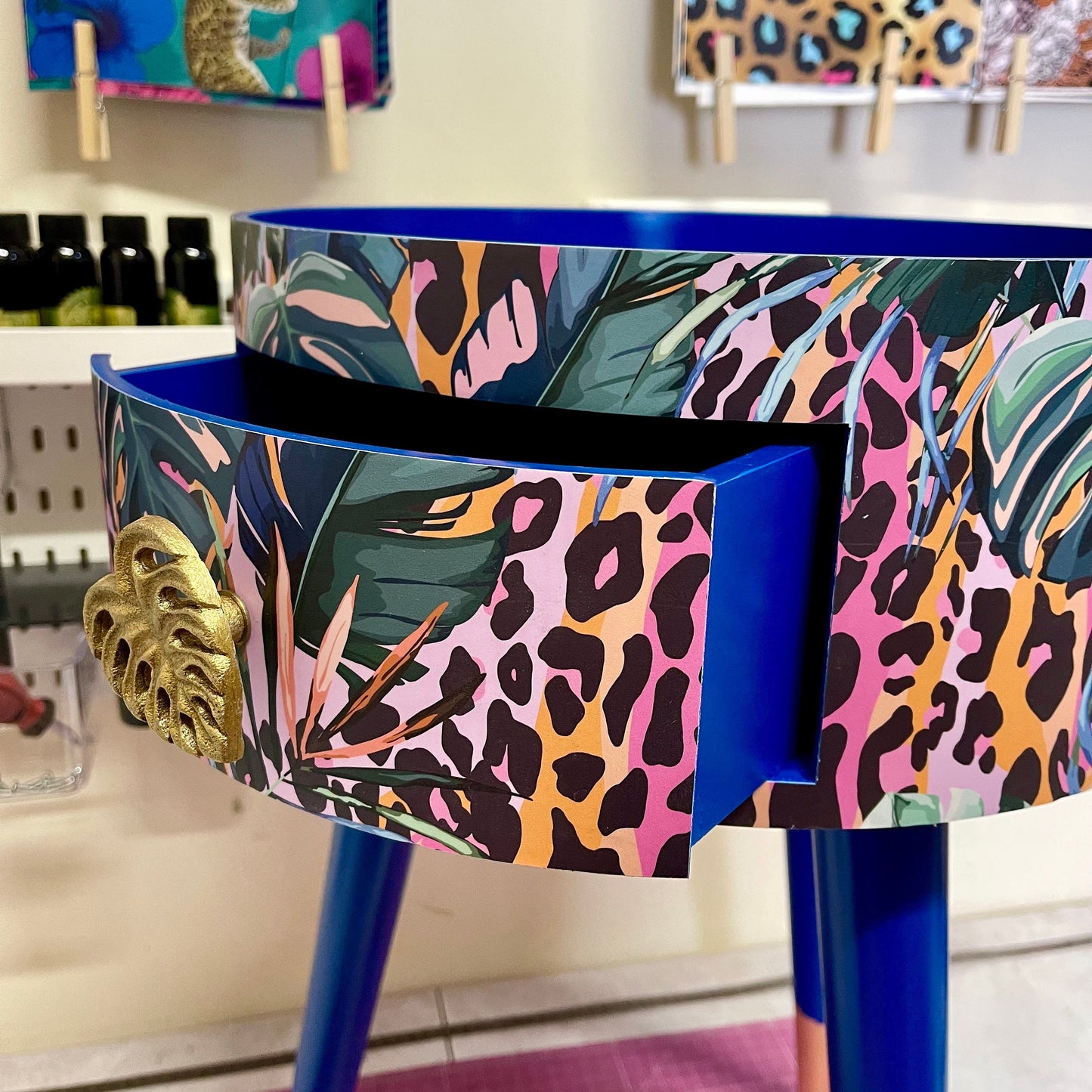 Leopard with Palm - Cobalt blue, pink and orange side table. Leopard print design with leaf design. Personalised round nightstand and side table.