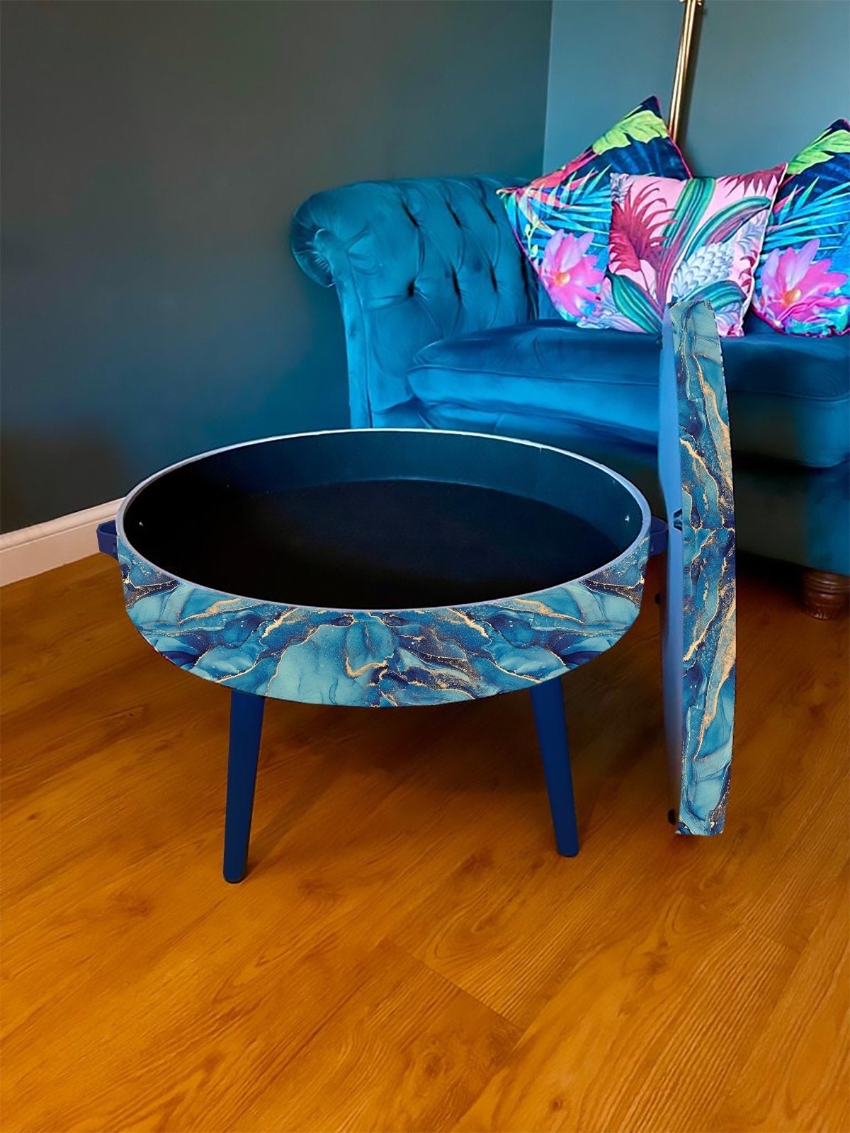 Round coffee table , blue and gold marble effect.  Navy blue and metallic effect. Round table, lift off top for storage. End table lounge