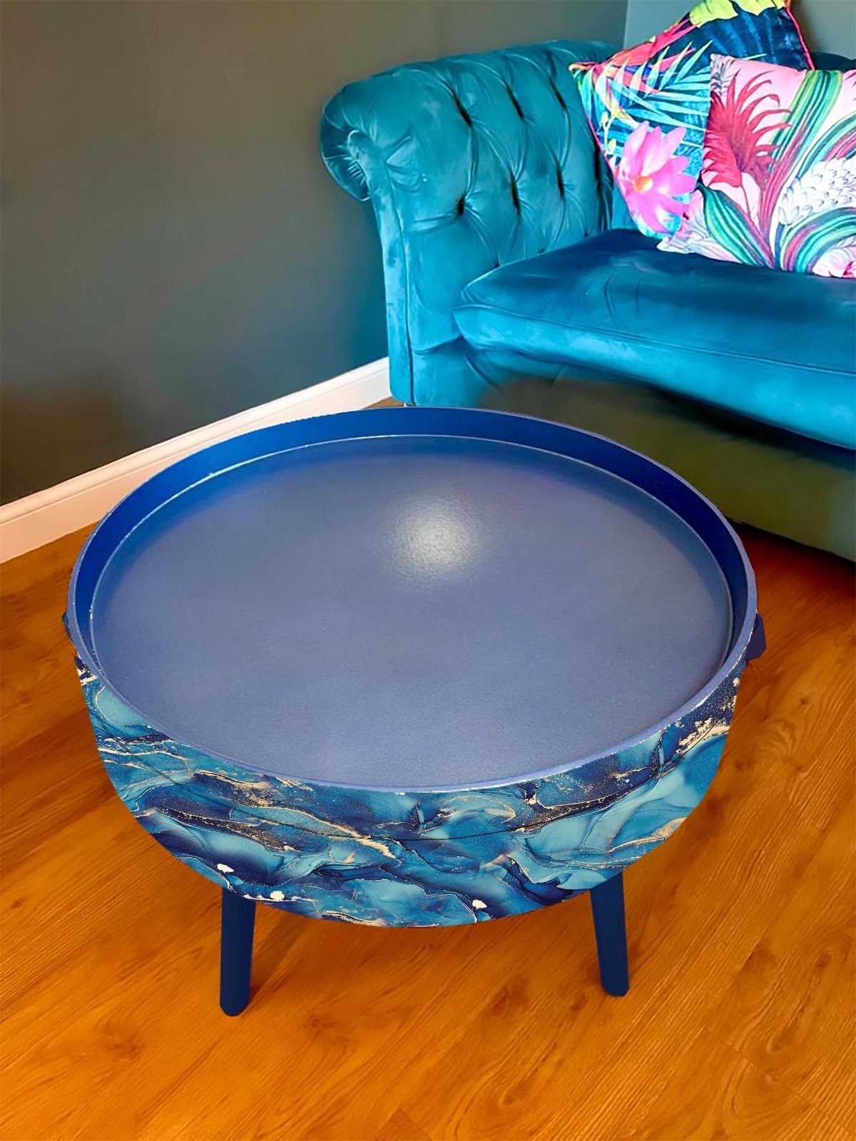 Round coffee table , blue and gold marble effect.  Navy blue and metallic effect. Round table, lift off top for storage. End table lounge