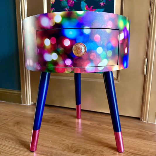 Christmas - Vintage Christmas lights round side table , multicoloured , pink, blue and green design with jewel colours. Nightstand. Hanukkah end table