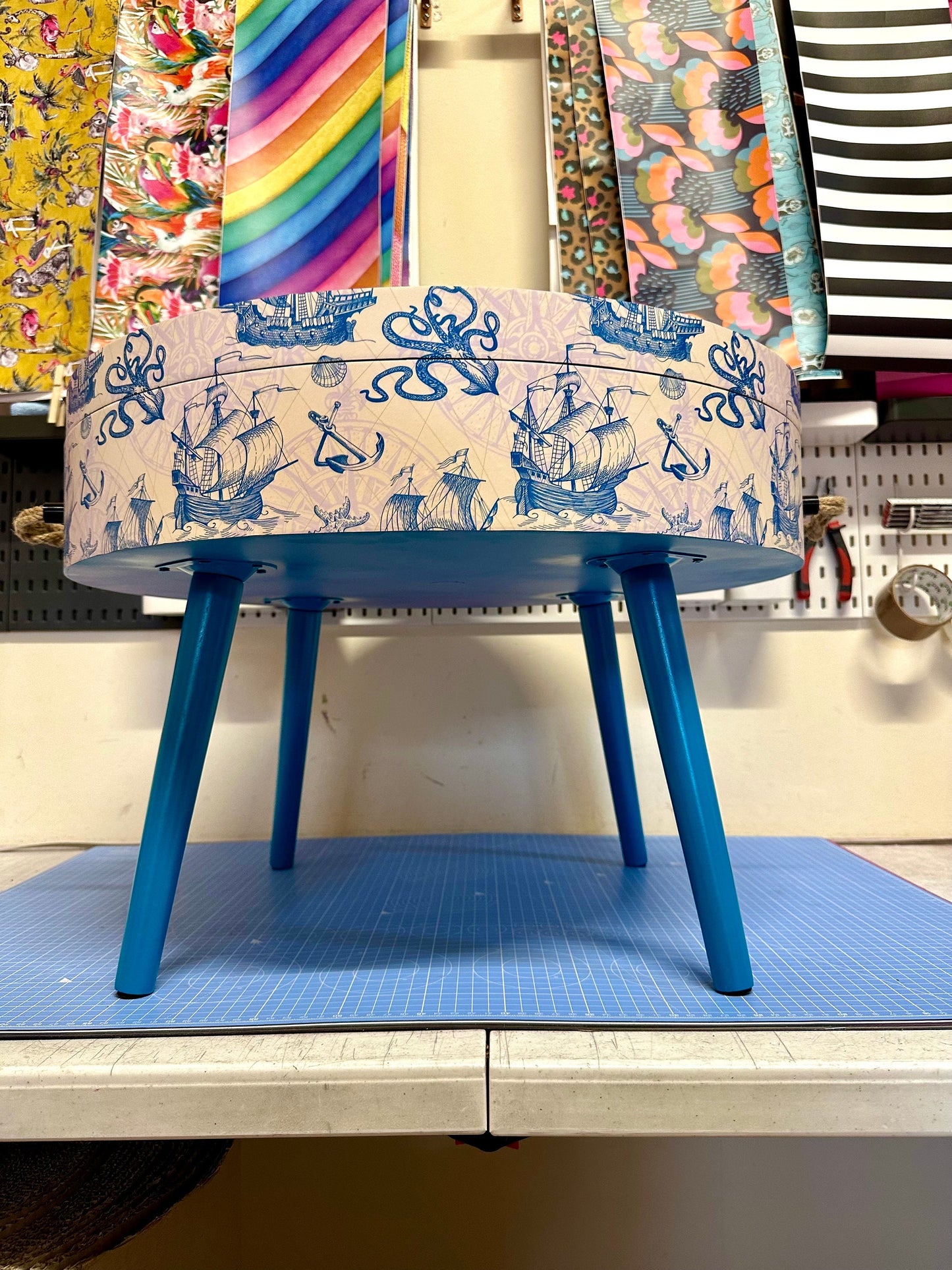 Round coffee table , Nautical sea design, blue, teal and cream. Boat decor. Round table, lift off top with storage . End table lounge