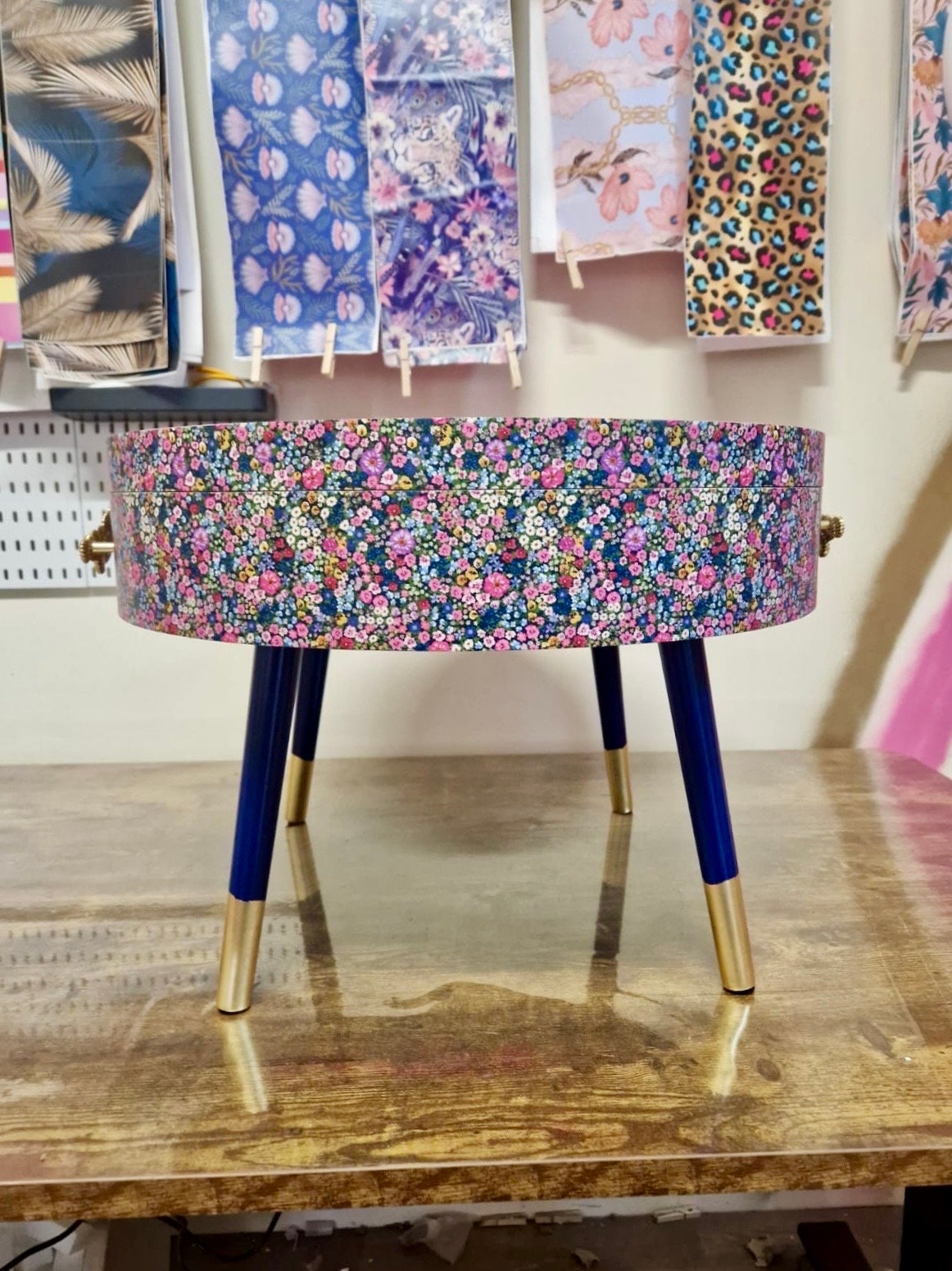 Round coffee table , ditsy floral, multicolour pink blue and green flower design. Round table, lift off top for storage. End table lounge