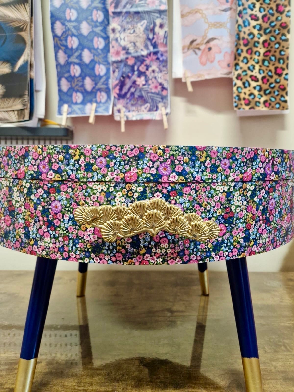 Round coffee table , ditsy floral, multicolour pink blue and green flower design. Round table, lift off top for storage. End table lounge