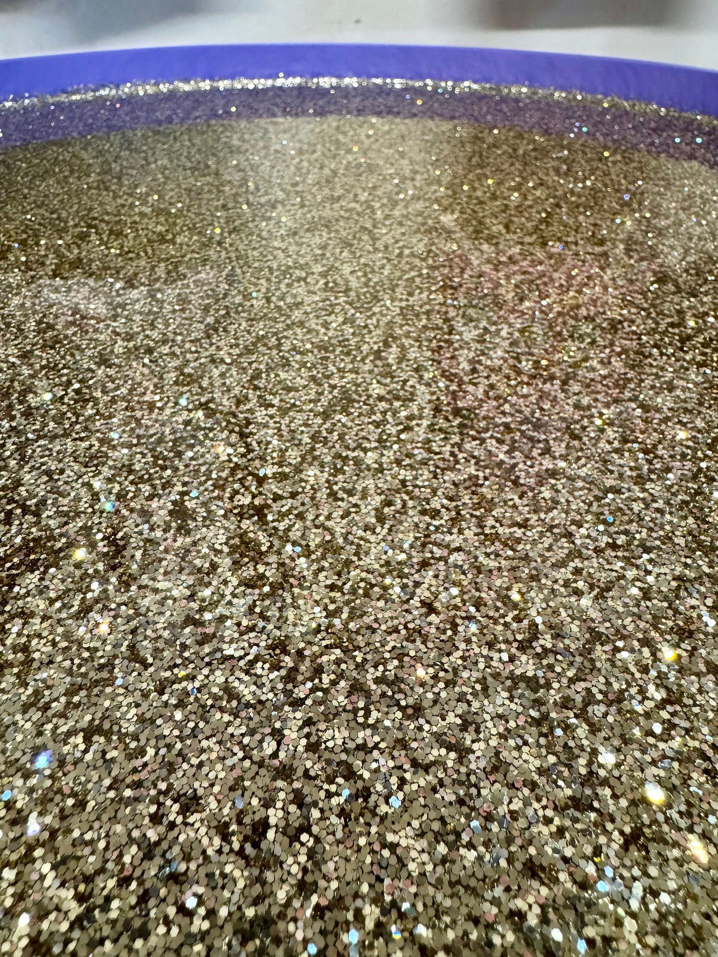 Round coffee table , peacock, blue, teal and turquoise feathers. Lilac purple gold glitter . Round table, storage, End table lounge