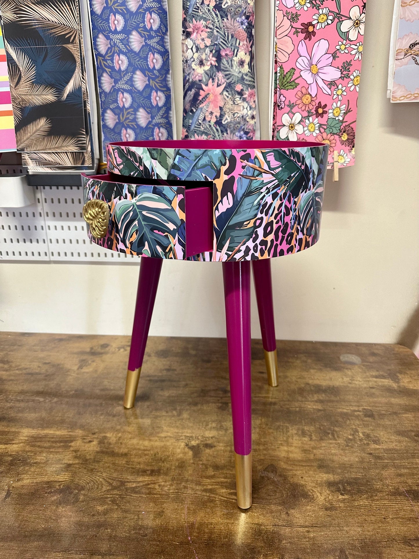 Leopard with Palm - Cherry blossom purple pink bedside table. Round wooden nightstand with leopard design in pinks, purples, greens. Cheetah end table with gold