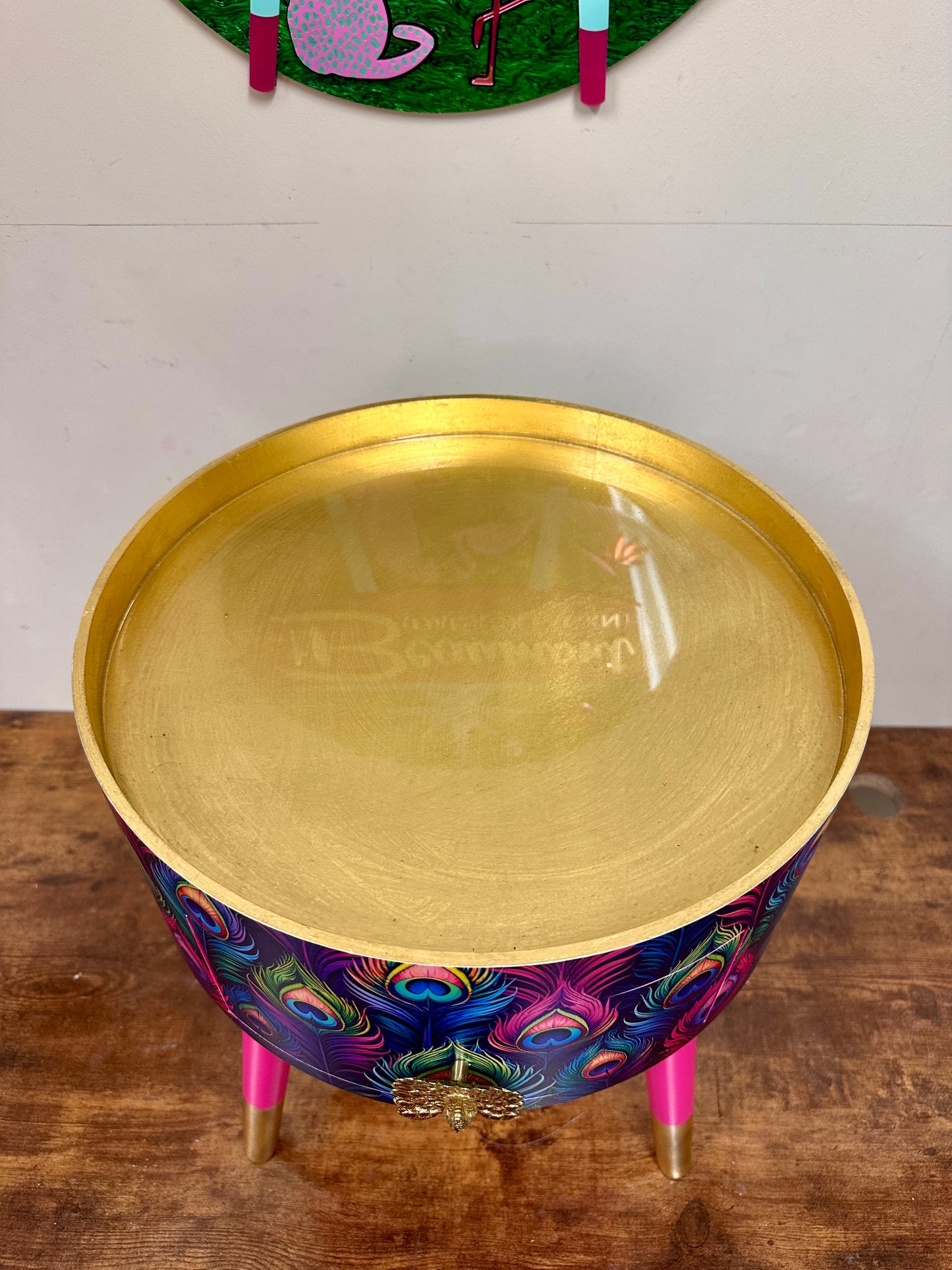 Colourful peacock table with gold leaf