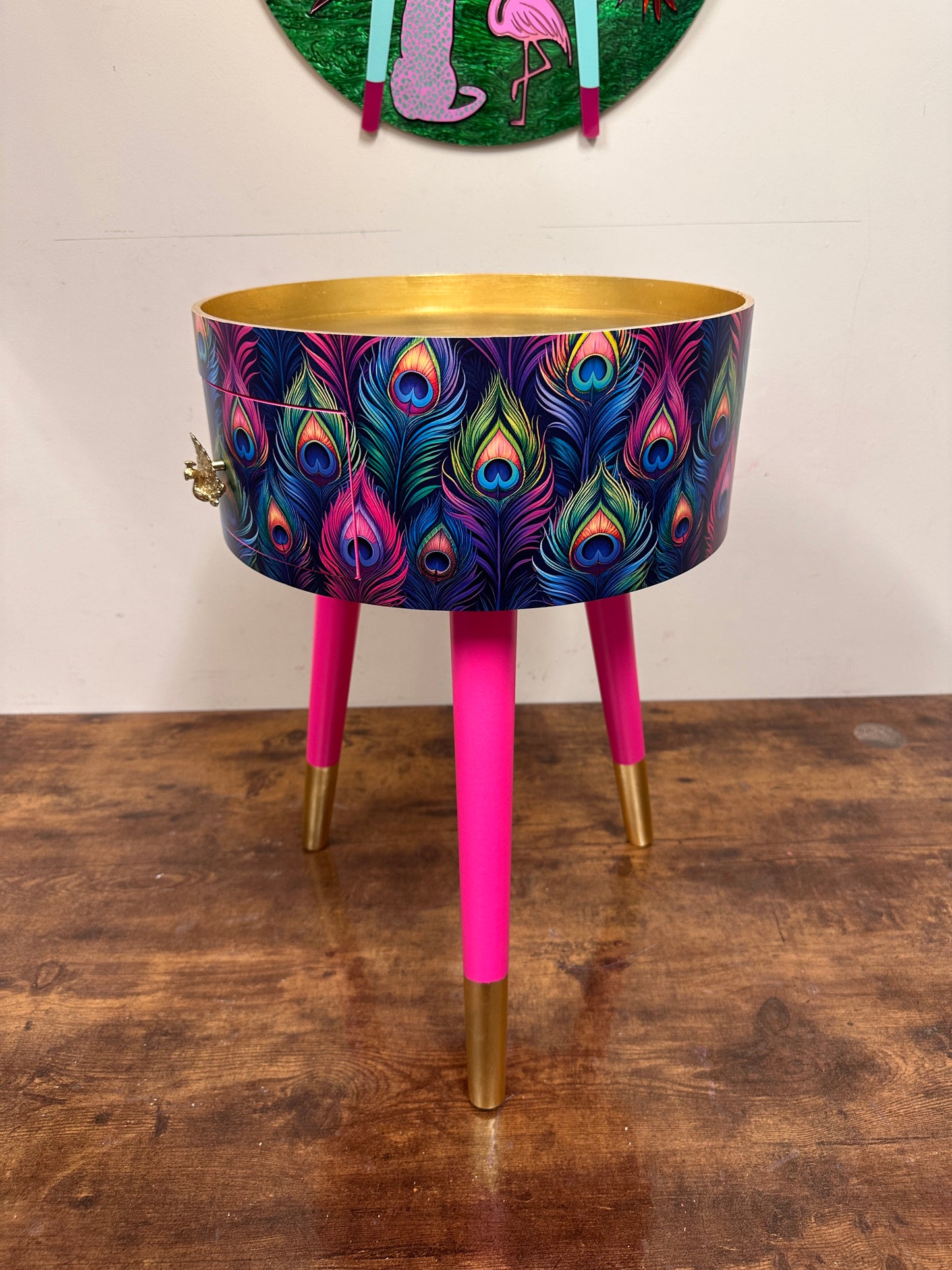 Colourful peacock table with gold leaf