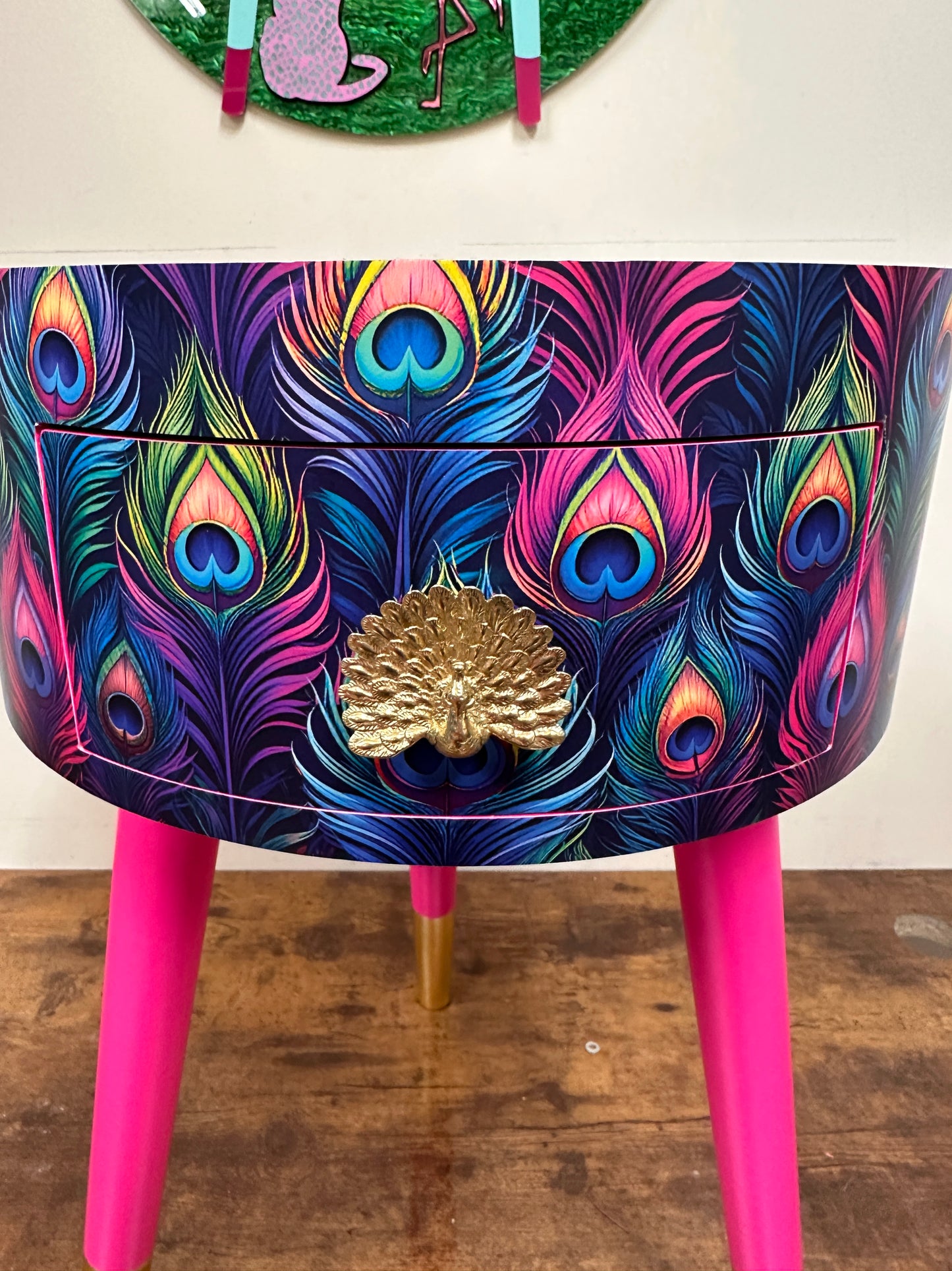 Colourful peacock table with gold leaf