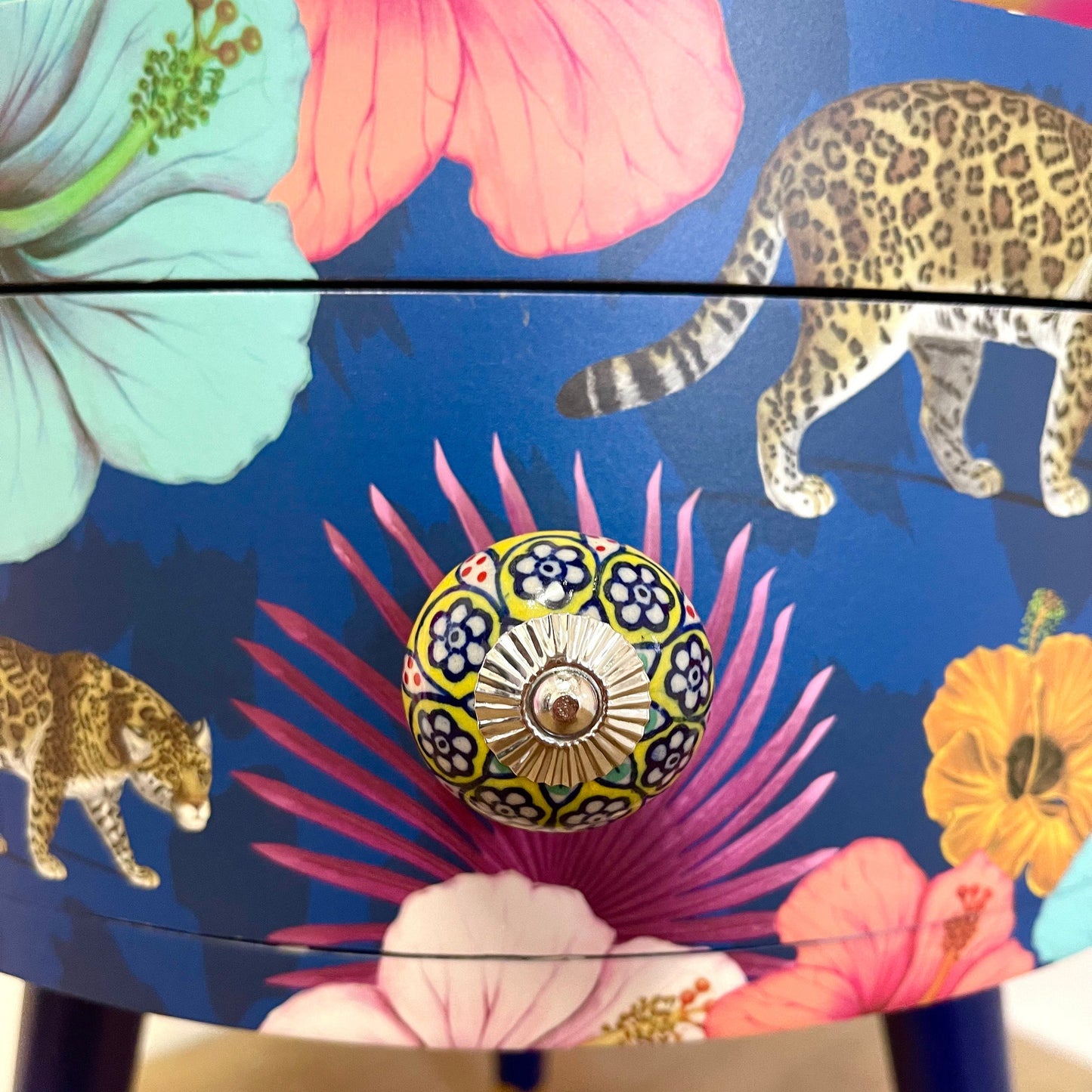 Flocking Fab - Navy Round bedside table with drawer, navy and yellow nightstand with tropical and leopard design.  Blue side table with storage, eclectic table