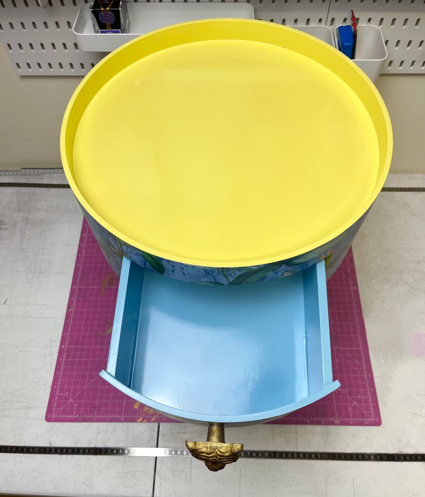 Round primrose yellow and baby blue zebra side table, leaf and tropical design Nightstand with drawer . Quirky fun table