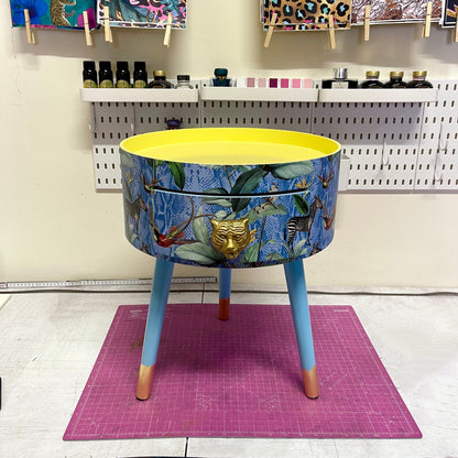 Round primrose yellow and baby blue zebra side table, leaf and tropical design Nightstand with drawer . Quirky fun table