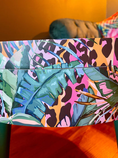 Round coffee table , tropical green pink and orange leopard print , Animal and floral print.  Round table, lift off top for storage