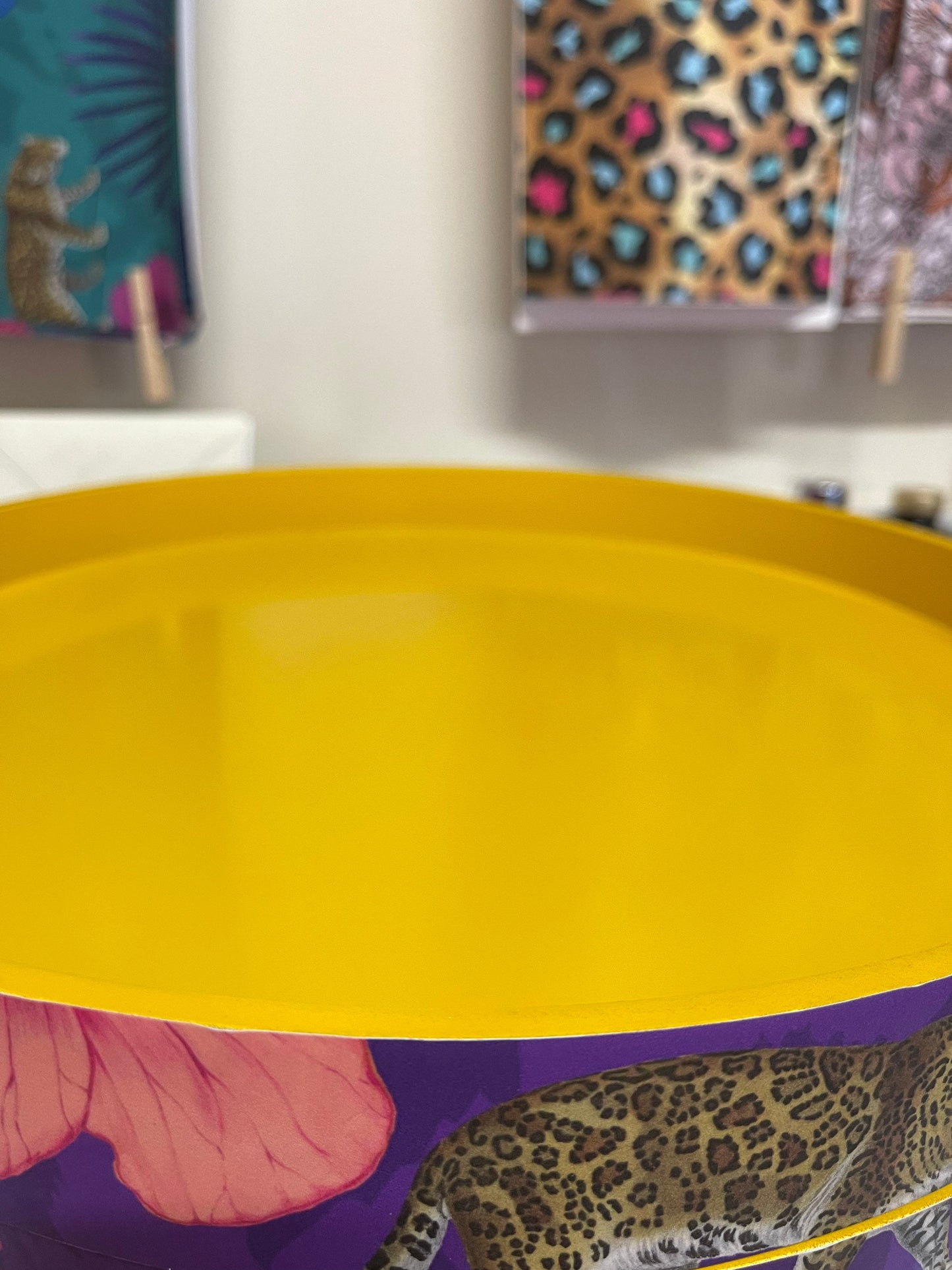 Flocking Fab - Purple side table. Round wooden table with drawer in purple yellow and pink tropical design. Personalised nightstand and side table.