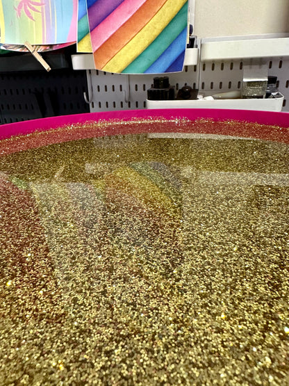 Round coffee table , peacock design, blue, teal and turquoise feathers. Bright pink. Round table, lift off top for storage. End table lounge