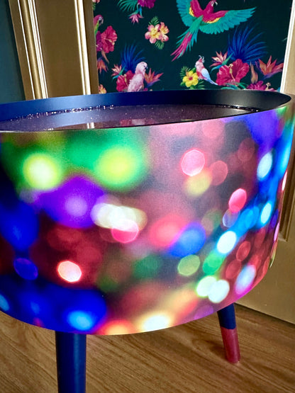 Christmas - Vintage Christmas lights round side table , multicoloured , pink, blue and green design with jewel colours. Nightstand. Hanukkah end table