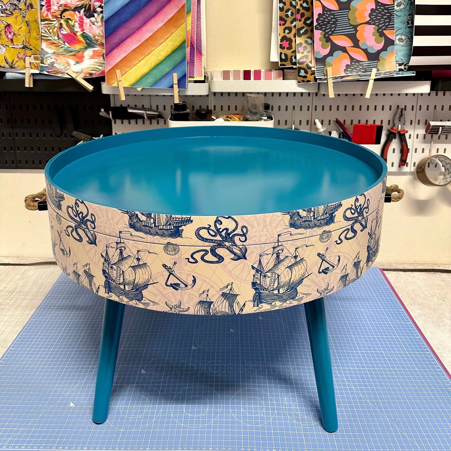 Round coffee table , Nautical sea design, blue, teal and cream. Boat decor. Round table, lift off top with storage . End table lounge