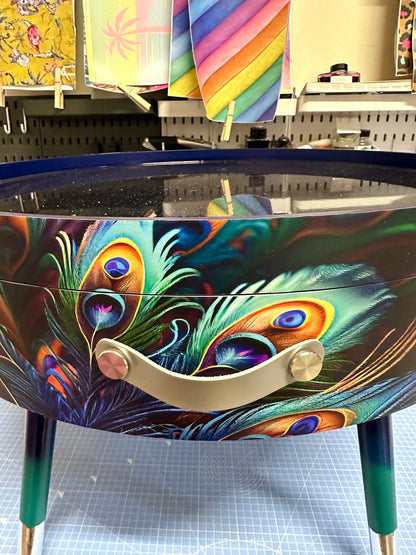 Round coffee table , peacock design, blue, teal  turquoise feathers. Navy Glitter . Round table, lift off top for storage. End table lounge
