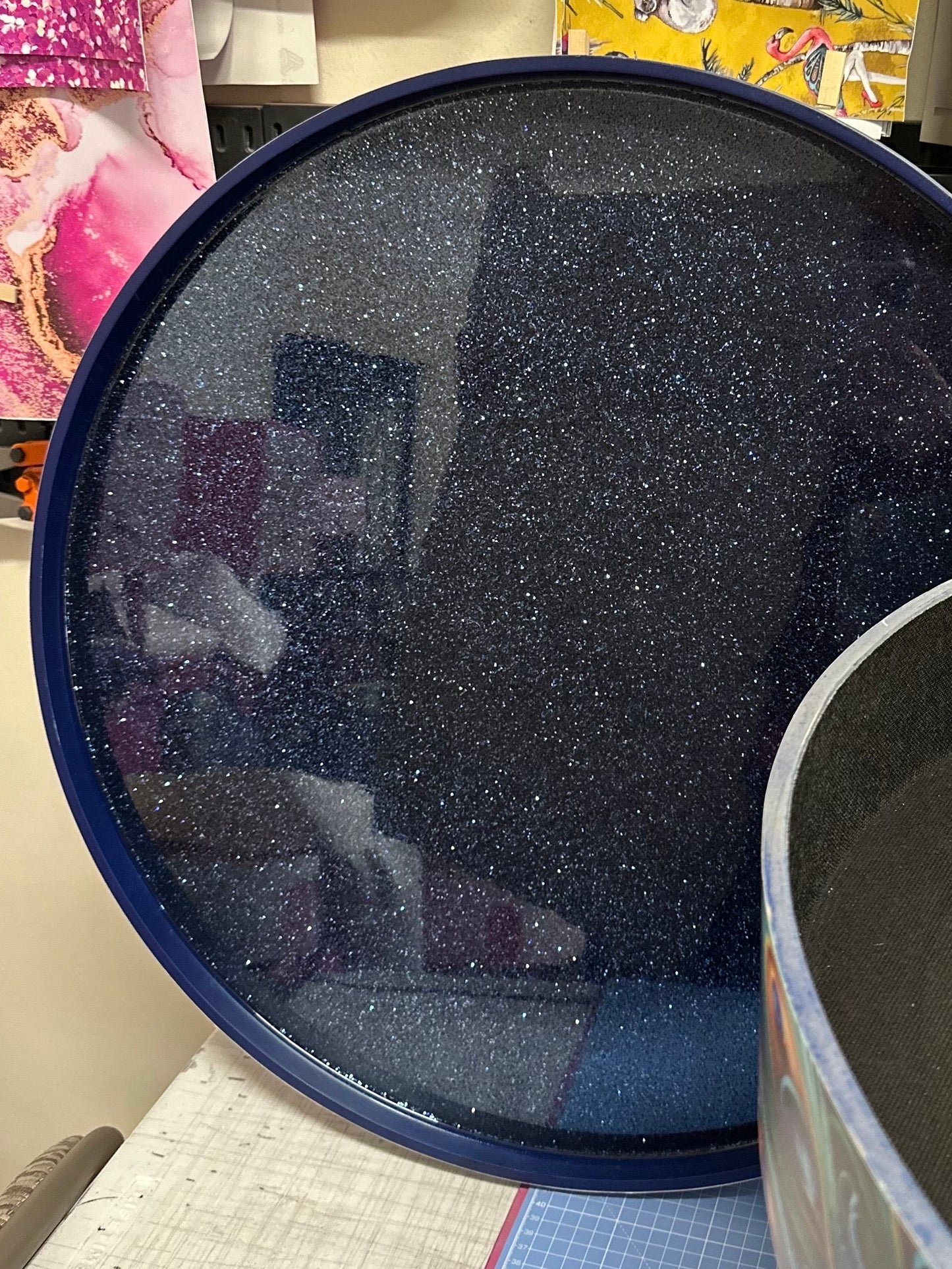 Round coffee table , peacock design, blue, teal  turquoise feathers. Navy Glitter . Round table, lift off top for storage. End table lounge