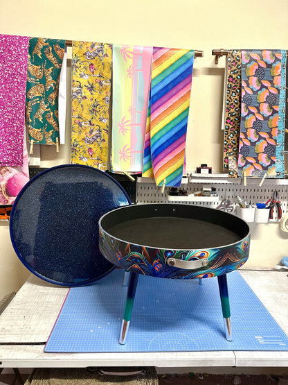 Round coffee table , peacock design, blue, teal  turquoise feathers. Navy Glitter . Round table, lift off top for storage. End table lounge