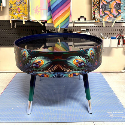 Round coffee table , peacock design, blue, teal  turquoise feathers. Navy Glitter . Round table, lift off top for storage. End table lounge