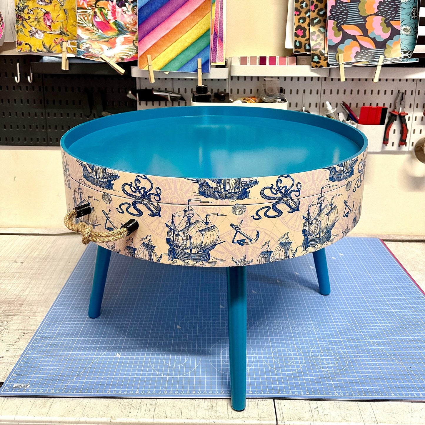 Round coffee table , Nautical sea design, blue, teal and cream. Boat decor. Round table, lift off top with storage . End table lounge