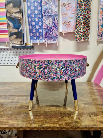 Round coffee table , ditsy floral, multicolour pink blue and green flower design. Round table, lift off top for storage. End table lounge