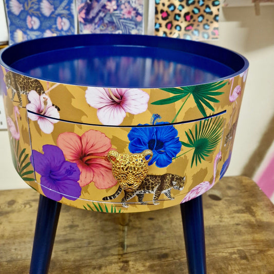 Flocking Fab - Yellow and navy round bedside table. Tropical design nightstand with flamingo and leopards. Cheetah and floral end table
