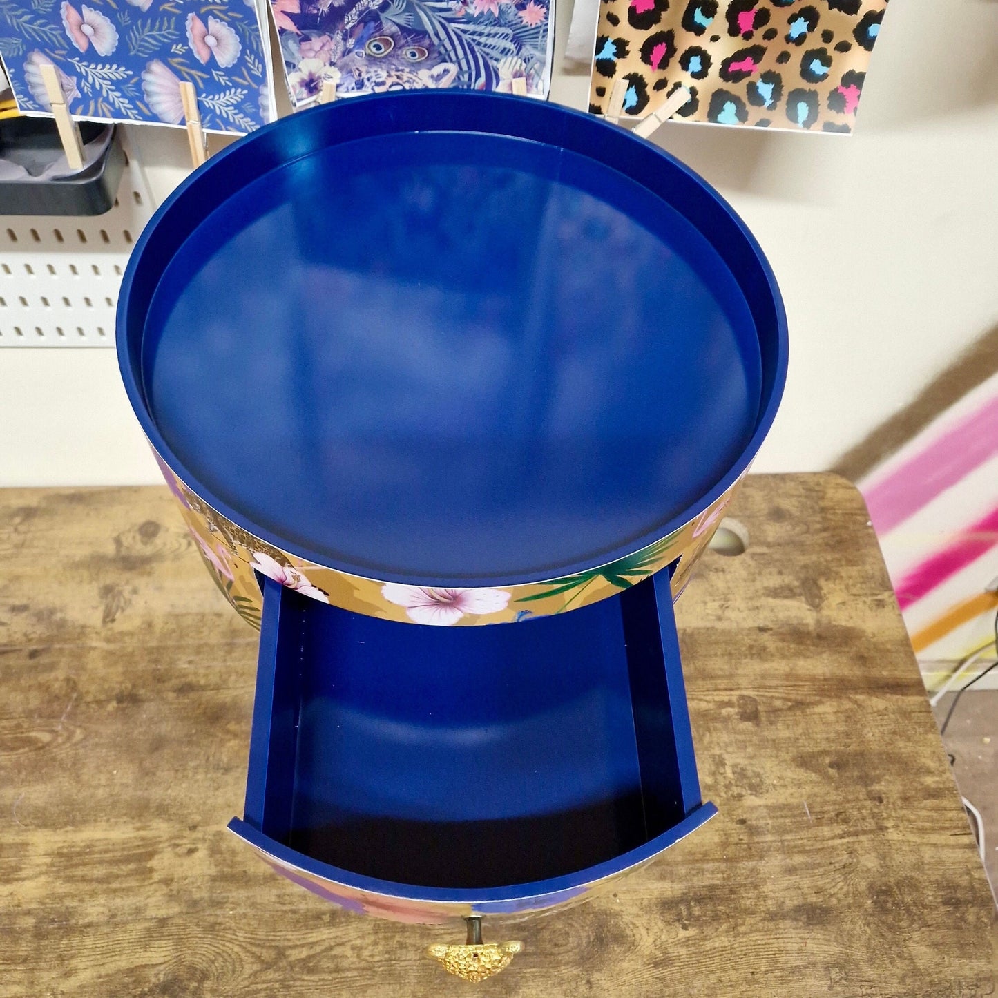 Flocking Fab - Yellow and navy round bedside table. Tropical design nightstand with flamingo and leopards. Cheetah and floral end table