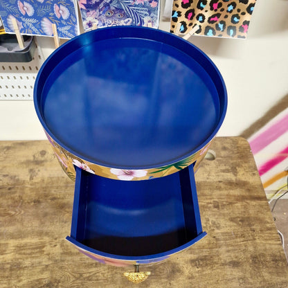 Flocking Fab - Yellow and navy round bedside table. Tropical design nightstand with flamingo and leopards. Cheetah and floral end table