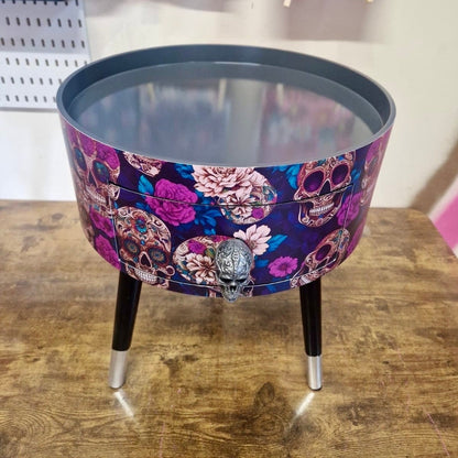 Skull design bedside table. Purple and black skull and roses, gothic inspired nightstand. Grey floral day of the dead end table