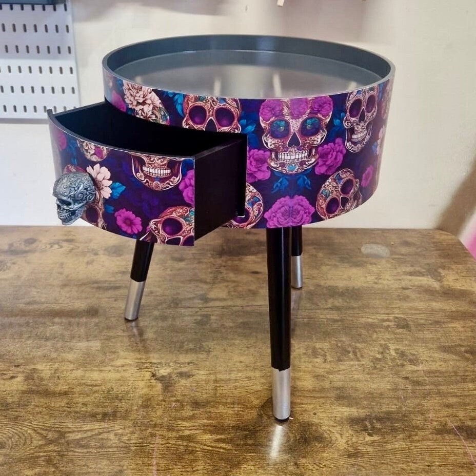 Skull design bedside table. Purple and black skull and roses, gothic inspired nightstand. Grey floral day of the dead end table