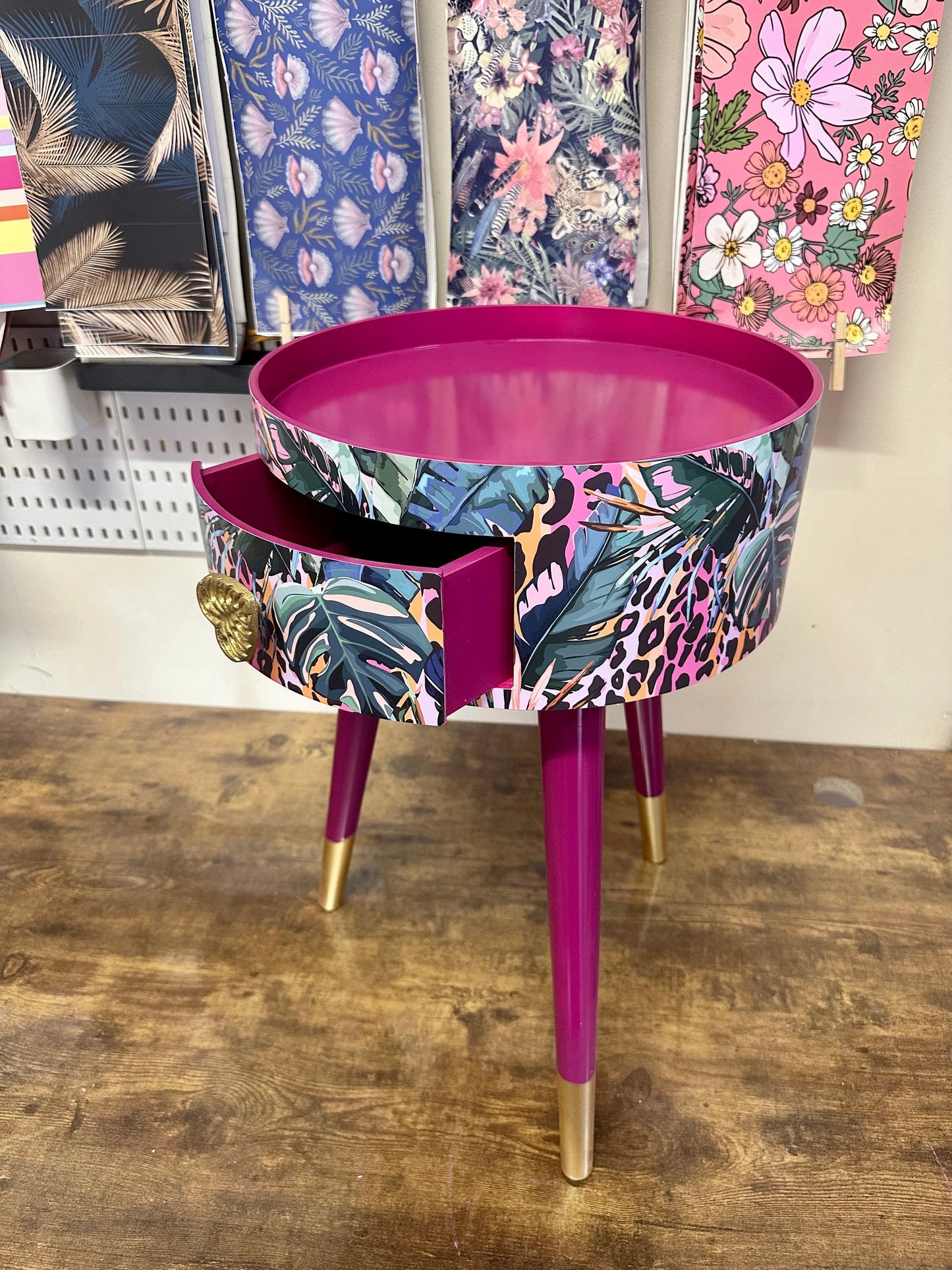 Leopard with Palm - Cherry blossom purple pink bedside table. Round wooden nightstand with leopard design in pinks, purples, greens. Cheetah end table with gold