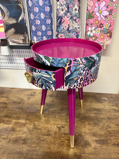 Leopard with Palm - Cherry blossom purple pink bedside table. Round wooden nightstand with leopard design in pinks, purples, greens. Cheetah end table with gold