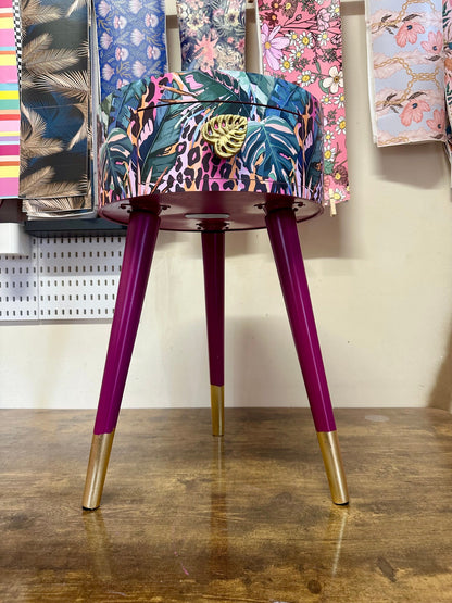 Leopard with Palm - Cherry blossom purple pink bedside table. Round wooden nightstand with leopard design in pinks, purples, greens. Cheetah end table with gold