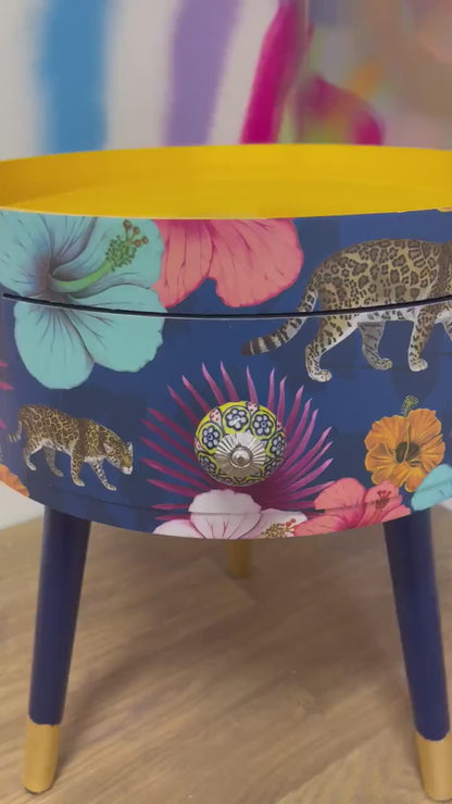 Flocking Fab - Navy Round bedside table with drawer, navy and yellow nightstand with tropical and leopard design.  Blue side table with storage, eclectic table